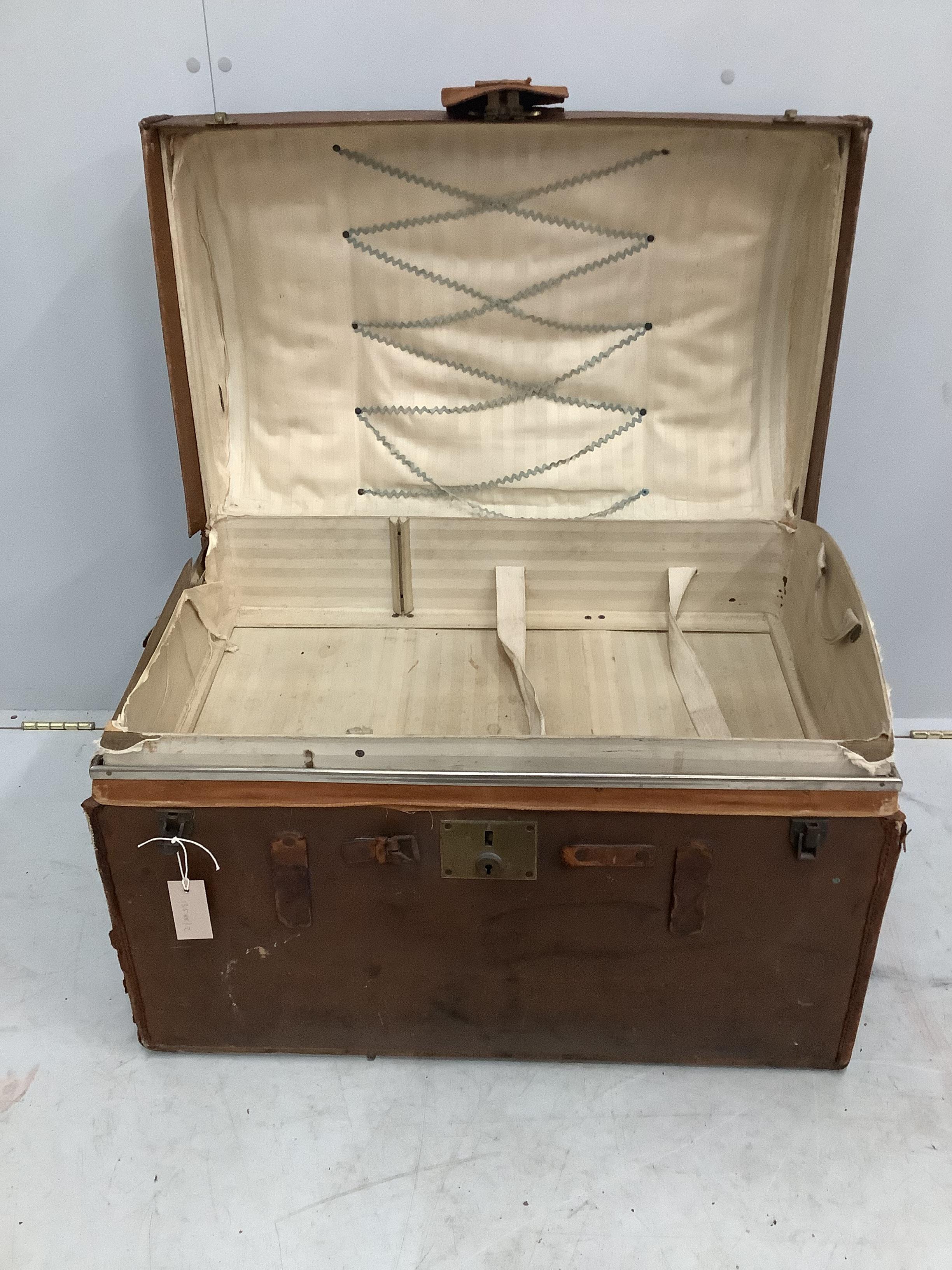 A Victorian canvas covered domed trunk, width 75cm, depth 47cm, height 57cm